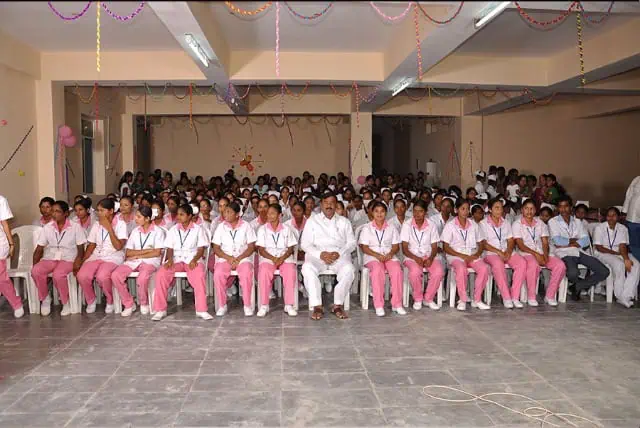 Nursing students with chairman at Chandana College of Nursing Suryapet